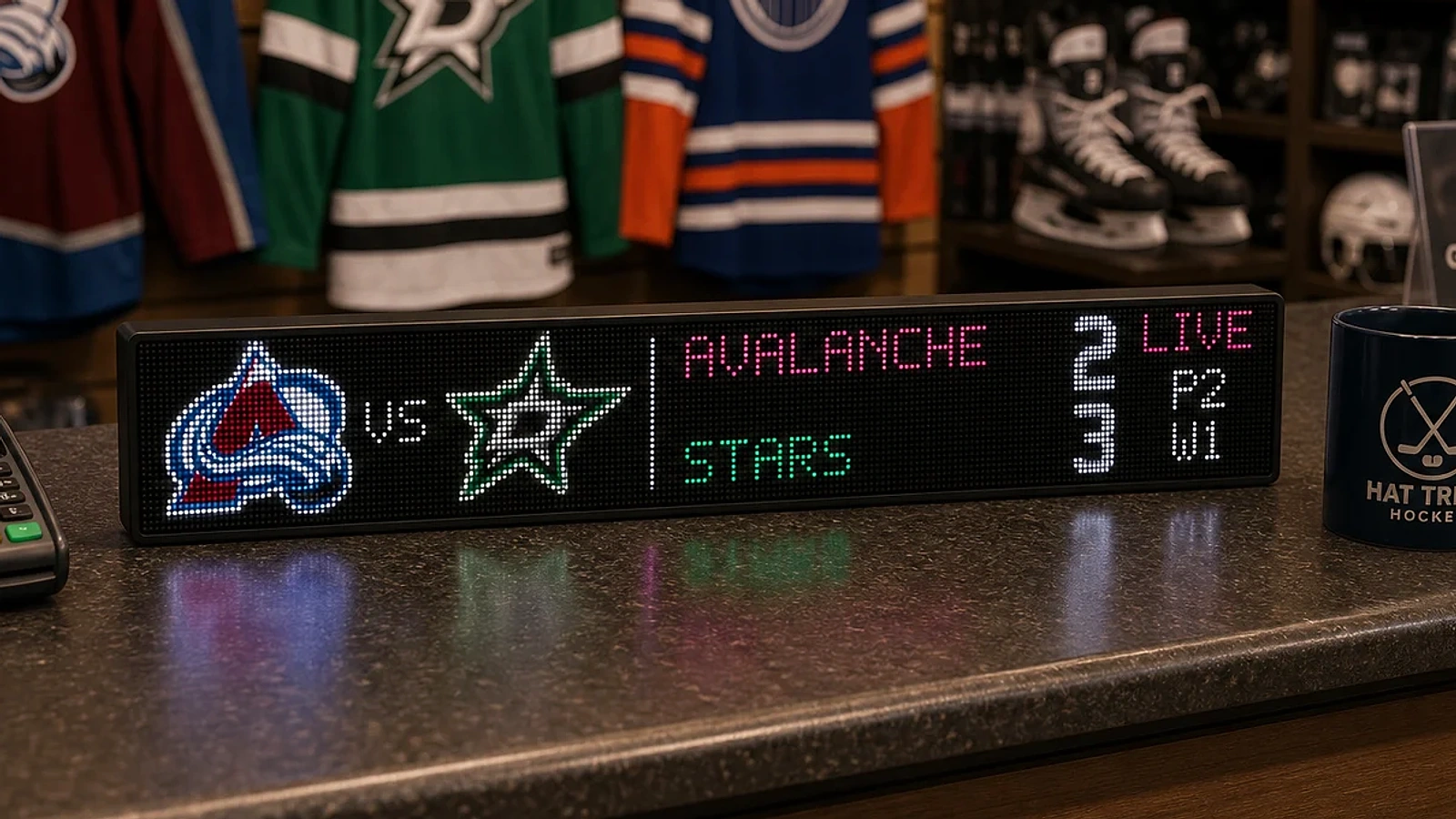 LumaGlow Scroll hockey score display on a retail counter